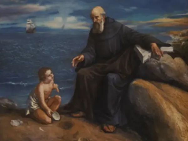 img of San Agustín paseando por la playa